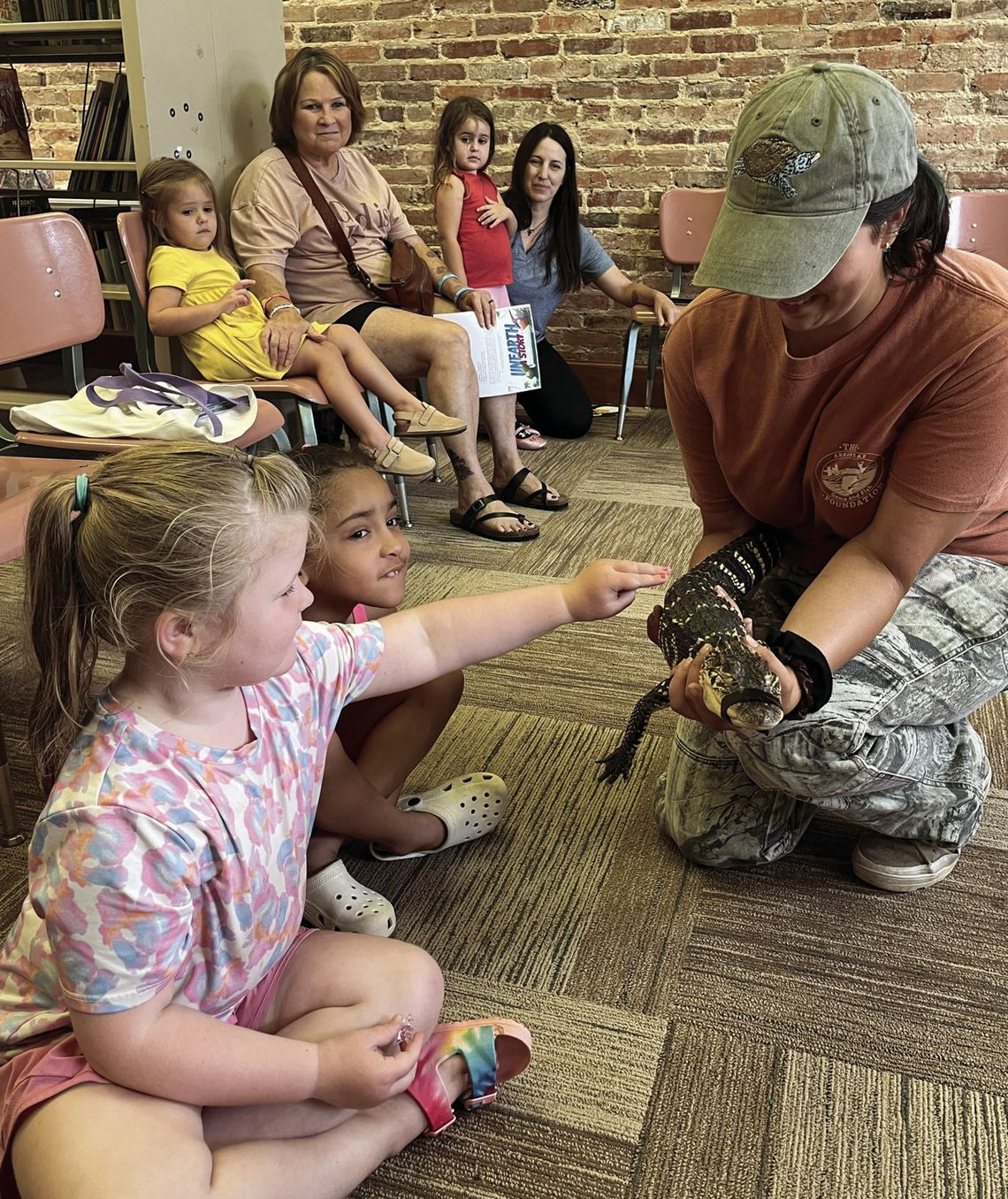 Heather from Delta Rivers Nature Center and Little Man the Alligator Heather from Delta Rivers Nature Center and Little Man the Alligator